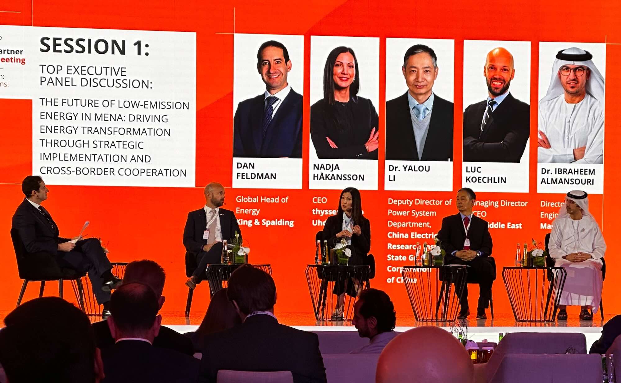 Top executive panel at a MENA energy conference discussing strategies for low-emission energy transformation and cross-border collaboration.